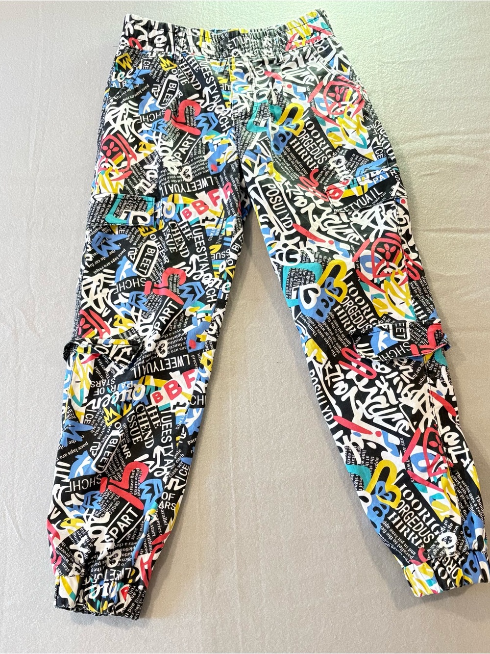 Y2K Vintage 90s Graffiti Newsprint All Over Prong Cargos Joggers Rave Pants